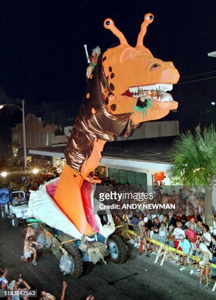Fast Buck Freddie's "Conch-A-Saurus Rex" rolls down Duval Street October 30, 1999 during the Fantasy Fest Parade, the highlight event of Key West's...