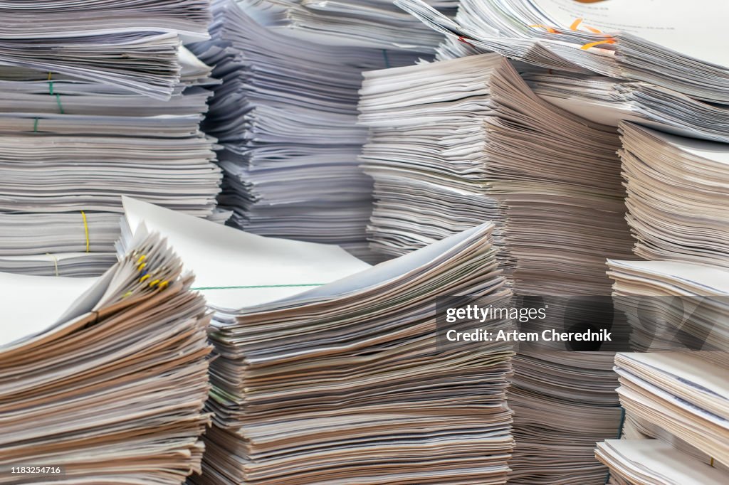 Pile of paper documents in the office