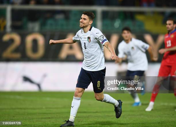 Jorginho of Italy celebrates with team-mates after scoring the goal during the UEFA Euro 2020 Qualifier between Italy and Armenia on November 18,...