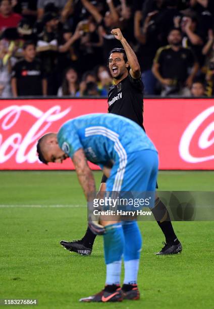 Carlos Vela of Los Angeles FC celebrates his goal behind David Bingham of Los Angeles Galaxy, to take a 1-0 lead, during the first half of the...