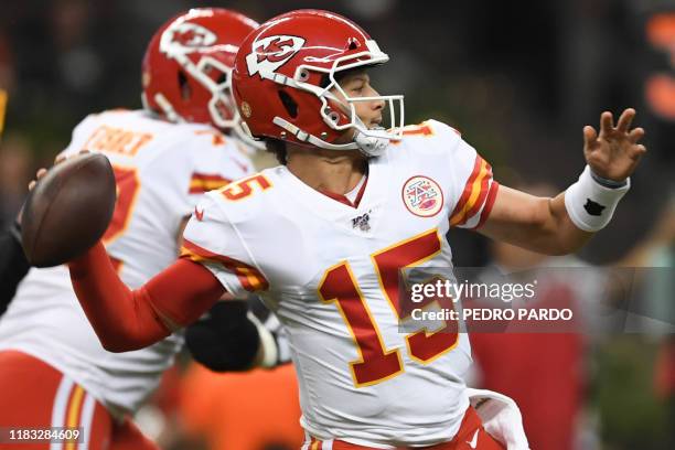 Kansas City Chief quarterback Patrick Mahomes prepares to throw during the 2019 NFL week 11 regular season football game between Kansas City Chiefs...