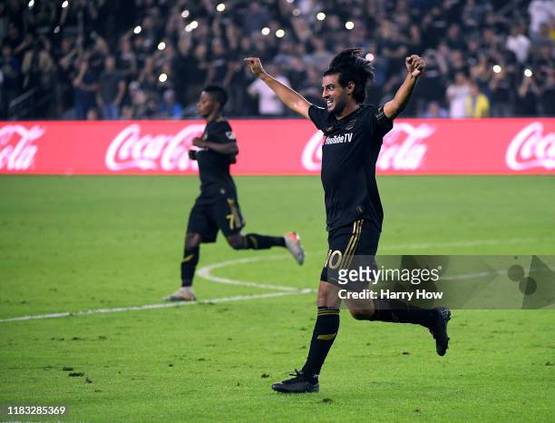 Carlos Vela of Los Angeles FC celebrates the whistle at the end of the game with Latif Blessing during a 5-3 win over the Los Angeles Galaxy in the...