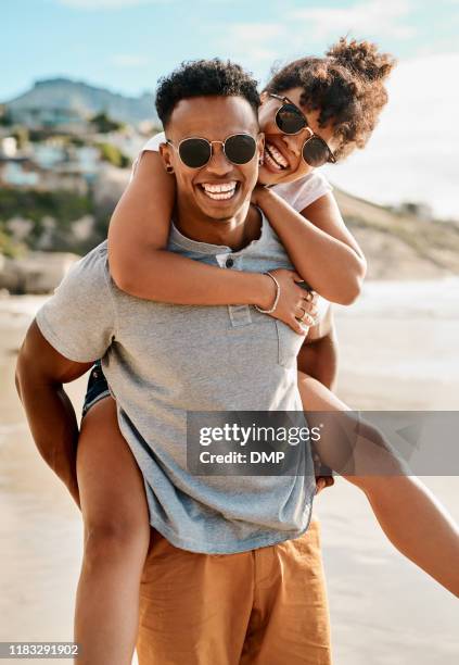 wherever life goes we'll get there together - couple on beach sunglasses stock pictures, royalty-free photos & images