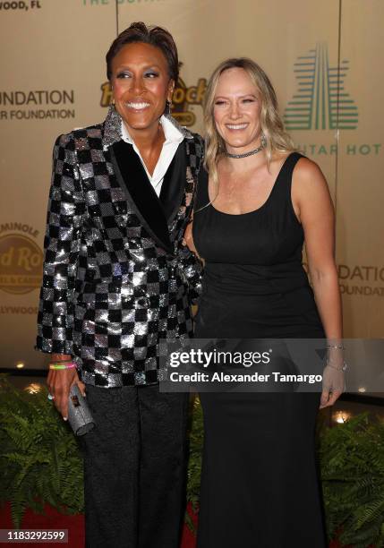 Robin Roberts and Amber Laign are seen arriving to the 2019 Shawn Carter Foundation Gala at Seminole Hard Rock Hotel and Casino on November 16, 2019...