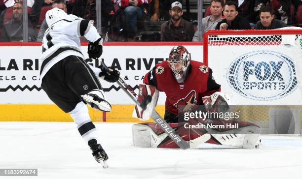 Goalie Antti Raanta of the Arizona Coyotes stops the puck on a shot by Austin Wagner of the Los Angeles Kings during the third period at Gila River...