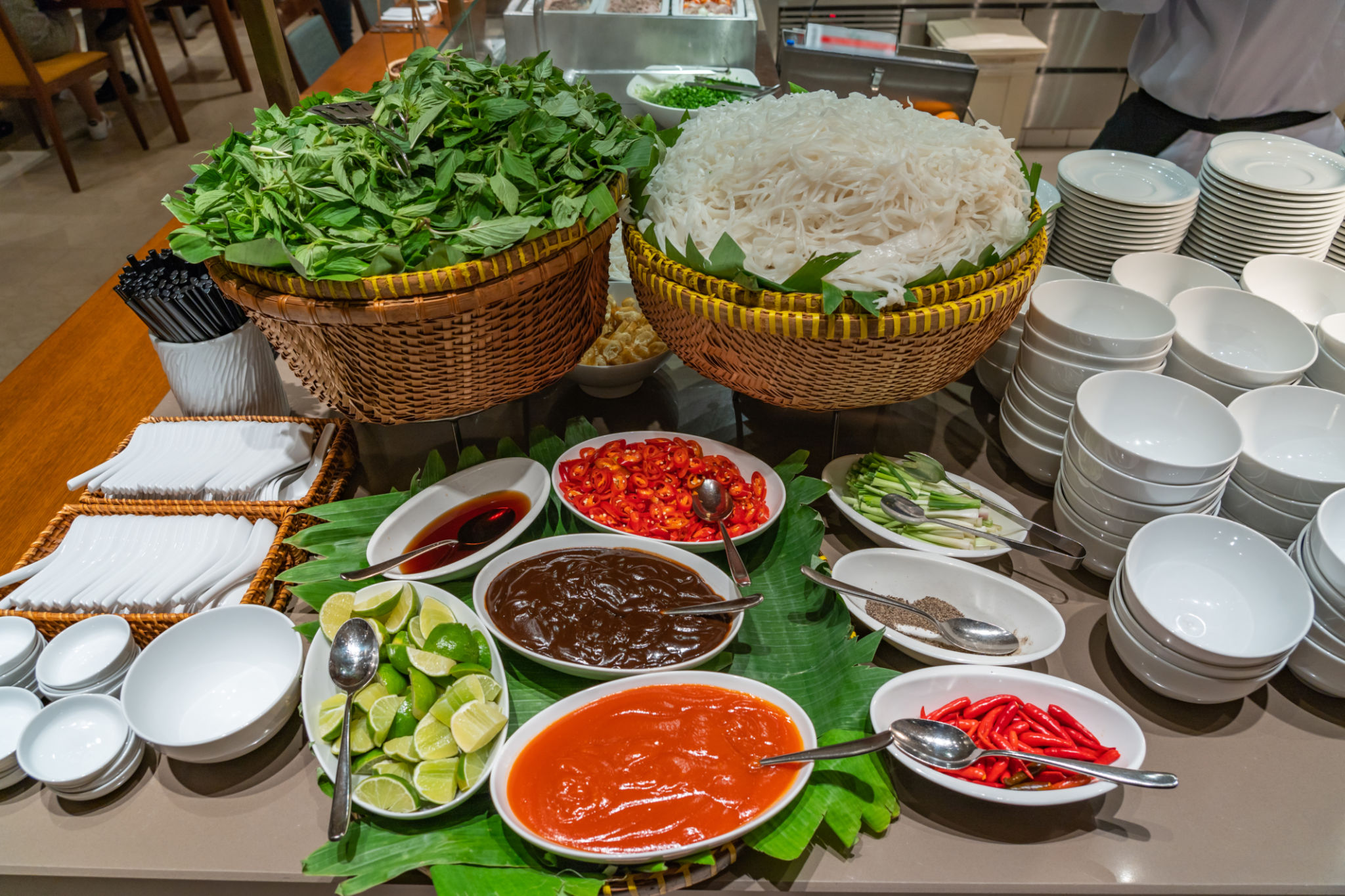 Traditional Vietnamese Pho noodle soup counter in Asian restaurant Traditional Vietnamese Pho noodle soup counter in Asian restaurant