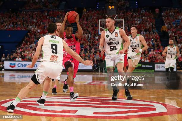 Bryce Cotton of the Wildcats drives to the basket during the round four NBL match between the Perth Wildcats and the South East Melbourne Phoenix at...