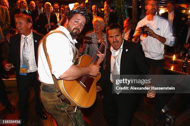 Munich 2018 Ambassador and Ludge Olympic champion Georg Hackl dance on the Deutsche Haus party at Moyo restaurant during the 123rd IOC session on...