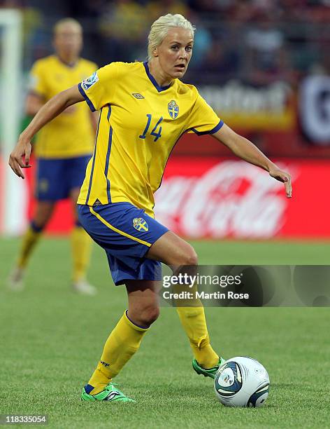 Josefine Oqvist of Sweden runs with the ball during the FIFA Women's World Cup 2011 Group C match between Sweden and USA at Wolfsburg Arena on July...