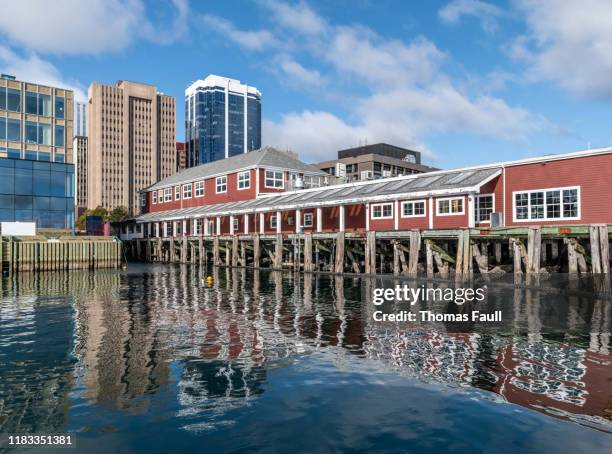 waterfront buildings, warehoueses and city skyline in halifax, canada - halifax harbour stock pictures, royalty-free photos & images