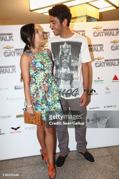 Noah Becker, son of former German tennis great Boris Becker, and his girlfriend Rafaela Sanchez attend the Chevrolet Underground Catwalk 2011 on July...