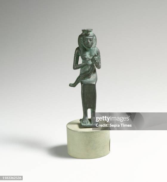 Bronze statuette of Isis with infant Horus, Late Dynastic-Hellenistic, 664-31 BC, Egyptian, Bronze, H. 3 5/8 inches , Bronzes, Seated Isis with child...