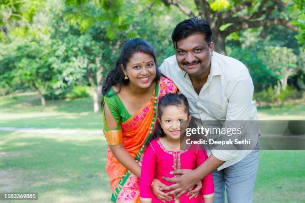 happy family outdoor in the park. stock photo - south india stock pictures, royalty-free photos & images