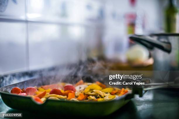 cooking vegetables on pan - carol cook stock pictures, royalty-free photos & images