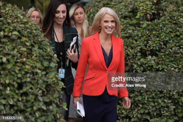 White House senior counselor Kellyanne Conway approaches members of the media outside the West Wing of the White House October 25, 2019 in...