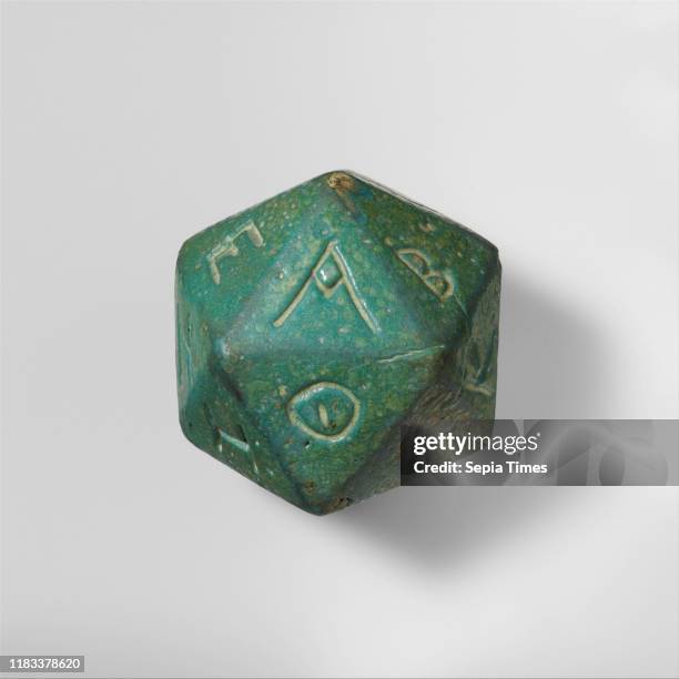 Faience polyhedron inscribed with letters of the Greek alphabet, Mid Imperial, 2nd-3rd century A.D., Roman, Faience, Width : 2 11/16 in., 7.2oz. ,...