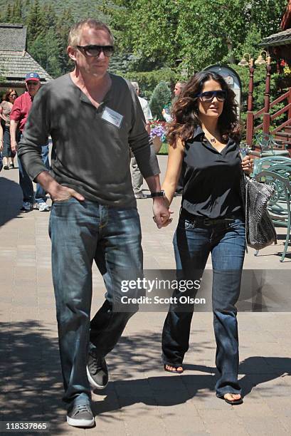 Francois-Henri Pinault , CEO of PPR, and his wife actress Salma Hayek attend the Allen & Company Sun Valley Conference on July 6, 2011 in Sun Valley,...