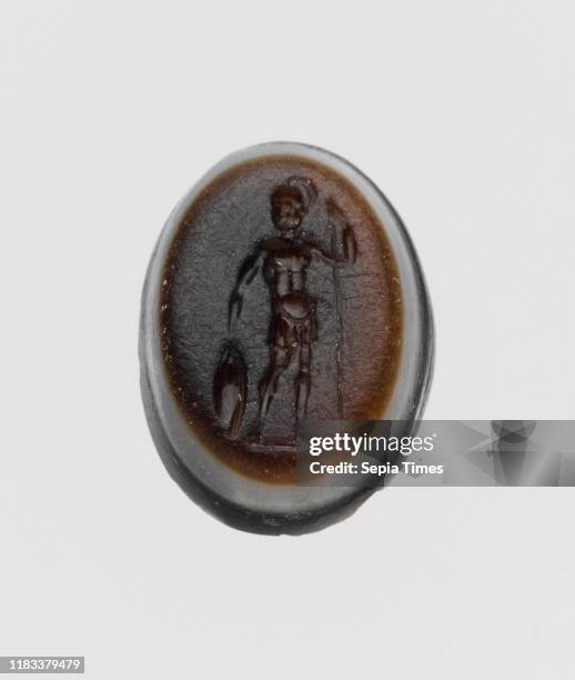 Sardonyx ring stone, Late Republican or Imperial, circa 1st century bc-3rd century A.D., Roman, Sardonyx, Length: 11/16 in. , Gems, Ares standing,...