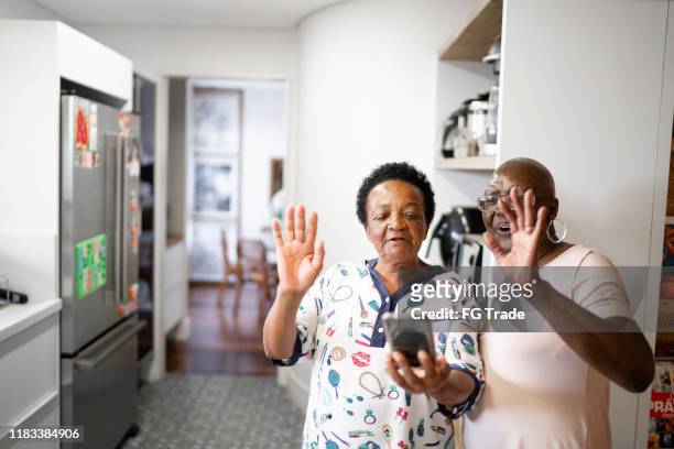 Senior women doing a video call using smartphone