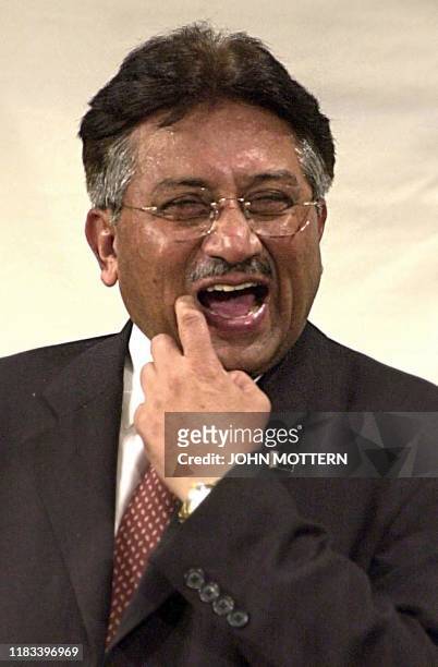Pakistani President Pervez Musharraf reacts to a question 08 September 2002 at Harvard University in Cambridge, Massachusetts. Musharraf begins a...