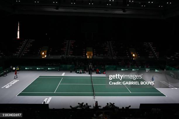 France's Gael Monfils serves the ball to Japan's Yoshihito Nishioka during the singles tennis match between France and Japan at the Davis Cup Madrid...