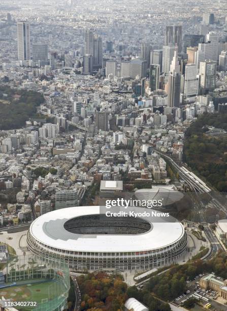 Photo taken in Tokyo from a Kyodo News helicopter on Nov. 19 shows the new National Stadium, the main venue for the 2020 Tokyo Olympics and...