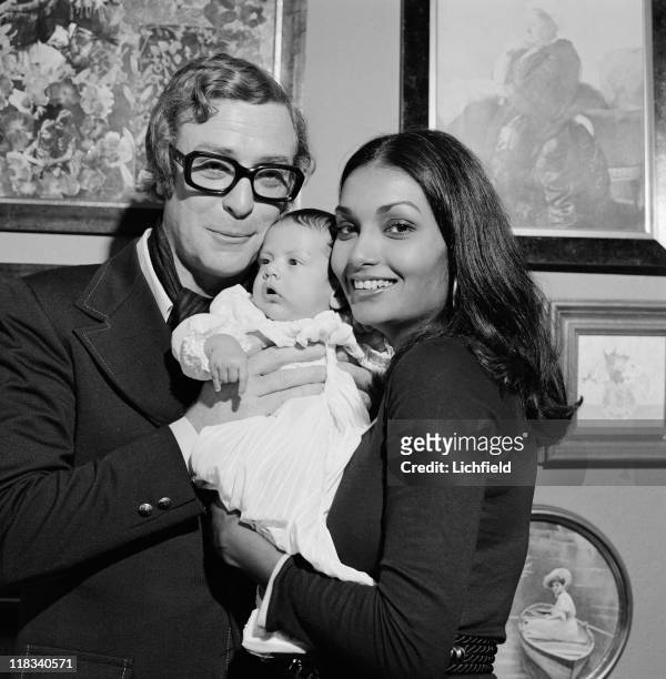 Michael Caine and family, British actor with his wife Shakira and daughter Natasha, 25th September 1973.