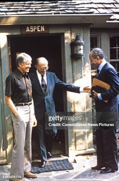 View of, from left, US President Jimmy Carter, Israeli Prime Minister Menachem Begin , and Egyptian President Anwar Al Sadat as they greet one...
