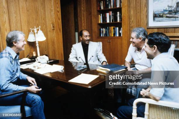 View of, from left, US President Jimmy Carter, Egyptian President Anwar Al Sadat , US Secretary of State Cyrus Vance , and Egyptian Ambassador to the...