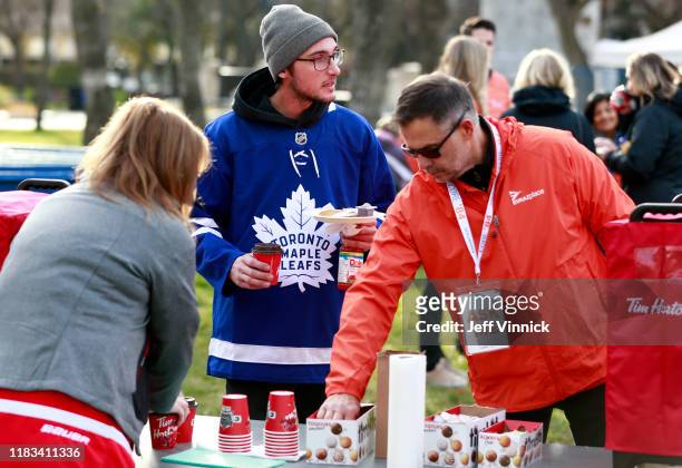 Fans enjoy coffee and pancakes during the Hockey Week Pancake Breakfast at the City Square Plaza on October 25, 2019 in Regina, Canada. The Calgary...