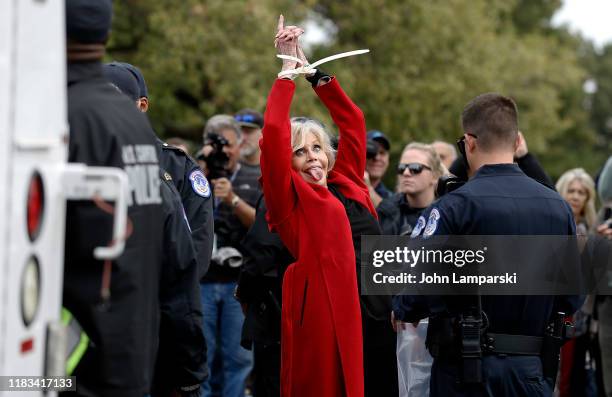 Actress Jane Fonda is arrested during the "Fire Drill Friday" Climate Change Protest on October 25, 2019 in Washington, DC . Protesters demand...