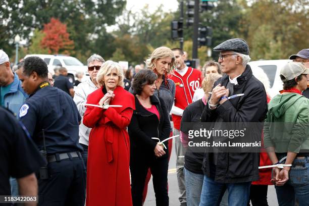 Actors Jane Fonda and Ted Danson are arrested during the "Fire Drill Friday" Climate Change Protest on October 25, 2019 in Washington, DC ....