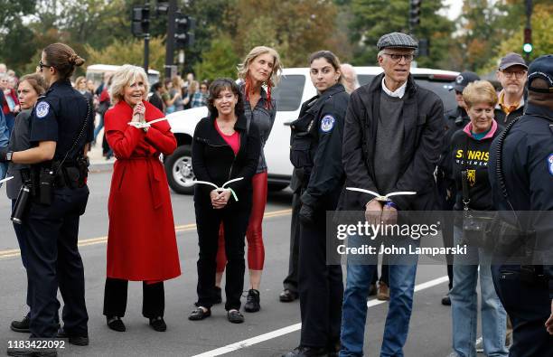 Actors Jane Fonda and Ted Danson are arrested during the "Fire Drill Friday" Climate Change Protest on October 25, 2019 in Washington, DC ....