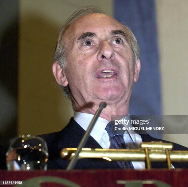 This 10 July 2001 photo shows Argentine President Fernando de la Rua speaks during a ceremony to mark the 147th anniversary of the Commerce Bourse in...