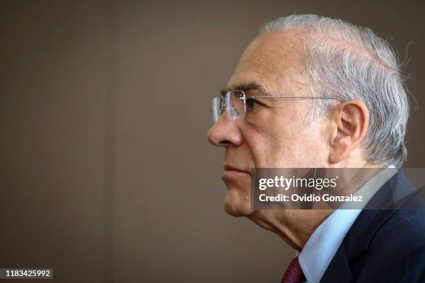 José Ángel Gurría, Secretary General of the OECD, looks on during a press conference at the Tequendama Hotel on October 25, 2019 in Bogota, Colombia....