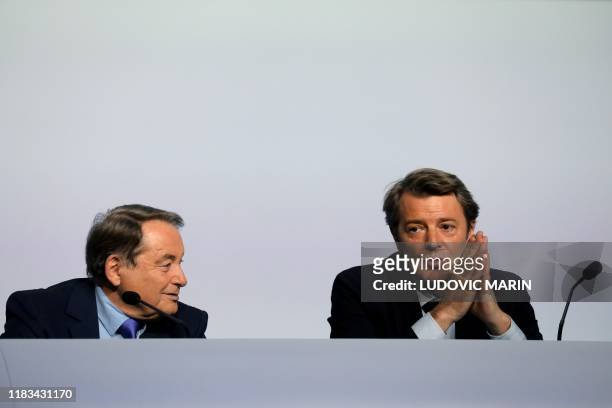 The President of the France's Mayors Organization Francois Baroin speaks as he attends with the Vice-President of the Association of French Mayors...