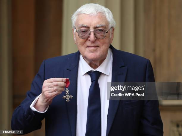 Snooker commentator Clive Everton MBE following an investiture ceremony at Buckingham Palace on November 19, 2019 in London, England.