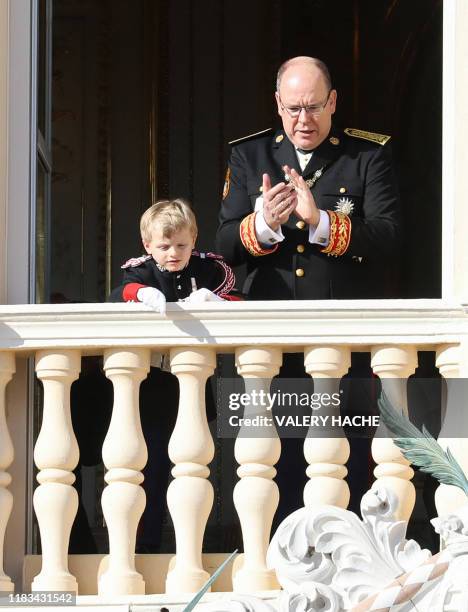 Prince Jacques and Prince Albert II of Monaco stand on a balcony of Monaco Palace during the celebrations marking Monaco's National Day in Monaco, on...