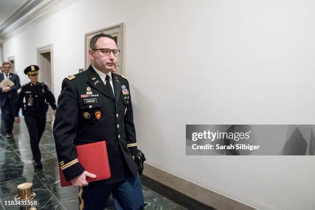 Lt. Col. Alexander Vindman, National Security Council Director for European Affairs, walks through the halls of the Longworth House Office Building...