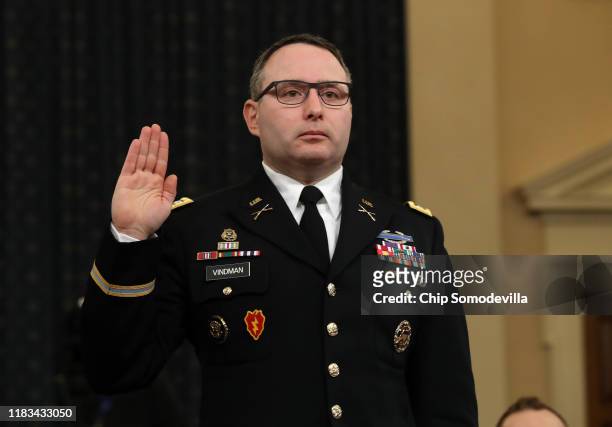 National Security Council Director for European Affairs Lt. Col. Alexander Vindman is sworn in to testify before the House Intelligence Committee in...