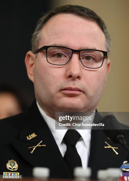 National Security Council Director for European Affairs Lt. Col. Alexander Vindman prepares to testify before the House Intelligence Committee in the...