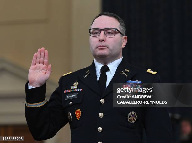 National Security Council Ukraine expert Lieutenant Colonel Alexander Vindman takes the oath before he testifies before the House Intelligence...