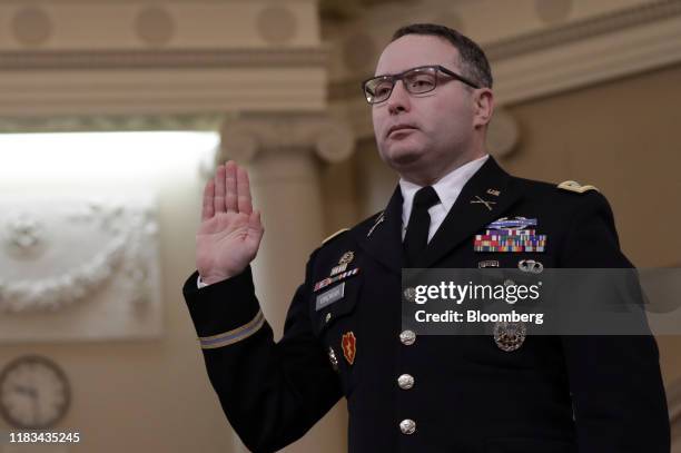 Alexander Vindman, director for European affairs on the National Security Council, swears in to a a House Intelligence Committee impeachment inquiry...