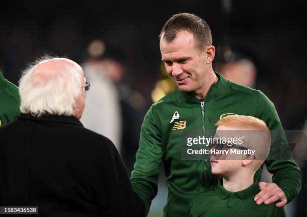 Dublin , Ireland - 18 November 2019; Glenn Whelan of Republic of Ireland and his son Jack Whelan meet President of Ireland Michael D Higgins prior to...