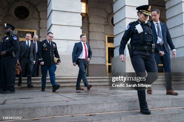 Lt. Col. Alexander Vindman, National Security Council Director for European Affairs, and his brother Leonid Vindman exit Longworth House Office...