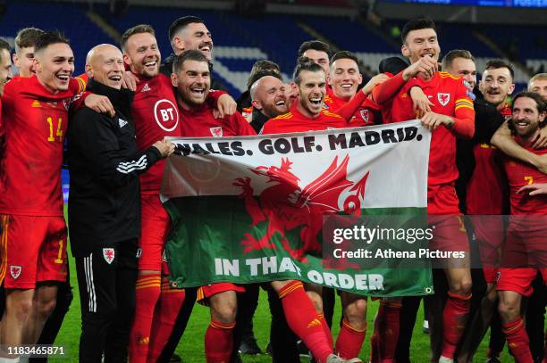 Wales celebrate at full time during the UEFA Euro 2020 Group E Qualifier match between Wales and Hungary at the Cardiff City Stadium on November 19,...