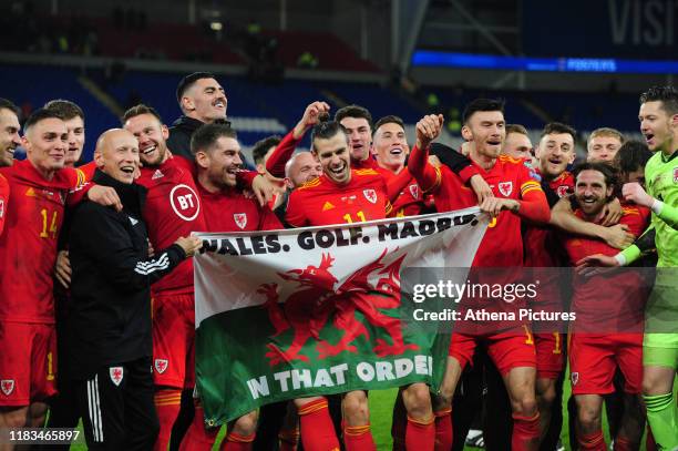 Wales celebrate at full time during the UEFA Euro 2020 Group E Qualifier match between Wales and Hungary at the Cardiff City Stadium on November 19,...