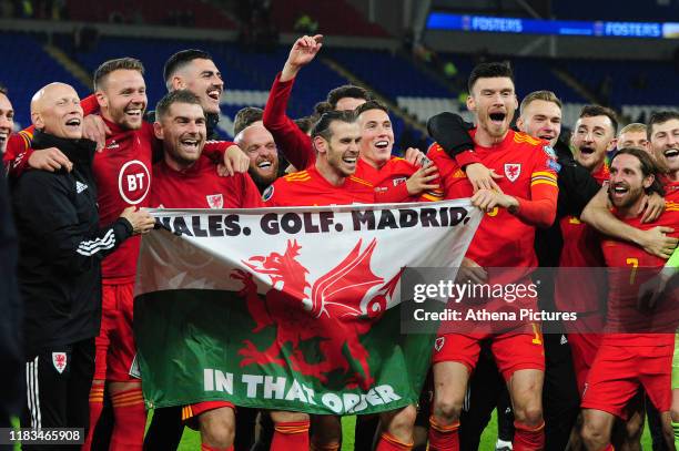 Wales celebrate at full time during the UEFA Euro 2020 Group E Qualifier match between Wales and Hungary at the Cardiff City Stadium on November 19,...