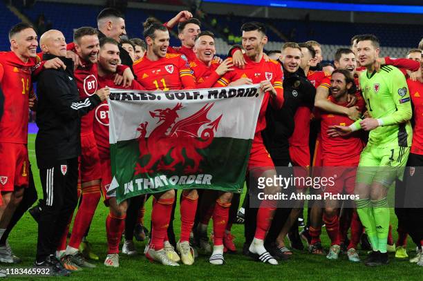 Wales celebrate at full time during the UEFA Euro 2020 Group E Qualifier match between Wales and Hungary at the Cardiff City Stadium on November 19,...