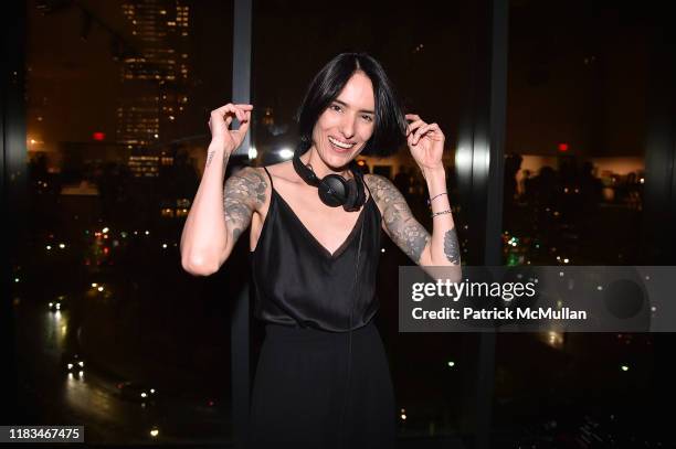 Elle Dee, wearing Max Mara, attends 25th Annual ARTWALK NY Benefiting Coalition For The Homeless Presented By Max Mara at Spring Studios on November...